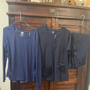 Koi next gen women’s 3 pocket scrub top, 7 pocket jogger scrub pants and shirt.